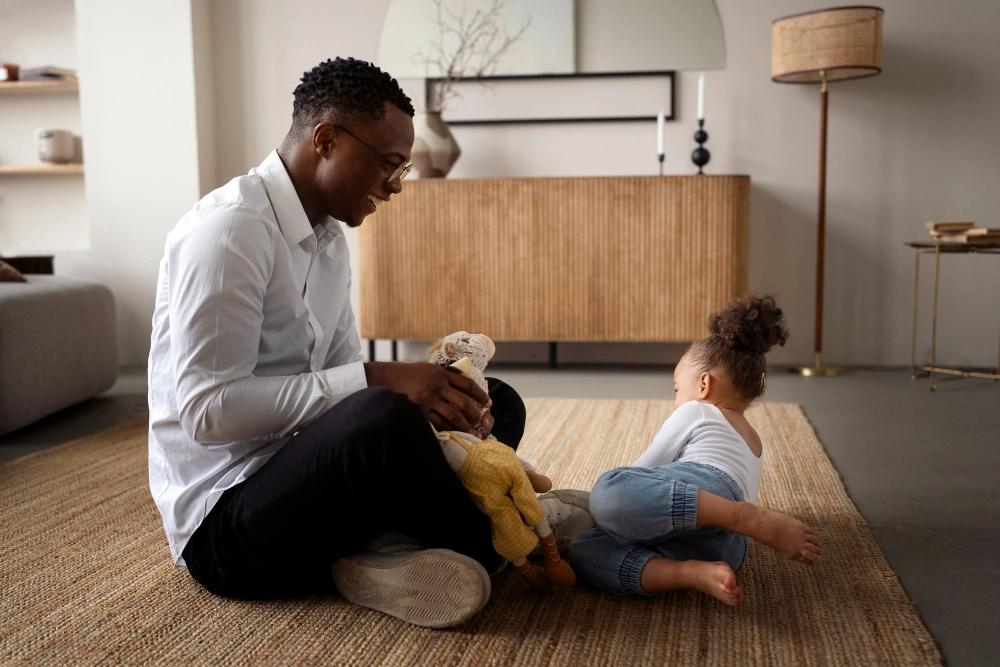 Black baby spending time with her dad